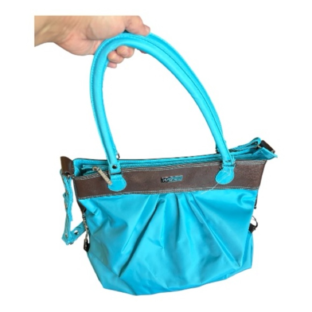 Hadaki Tote Around Pod handbag.